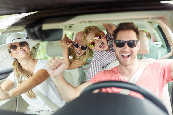 The Best Sing-Along Tunes for Your Summer Road Trip